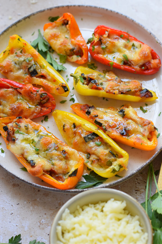 Small mini peppers stuffed with vegetables and cheese.