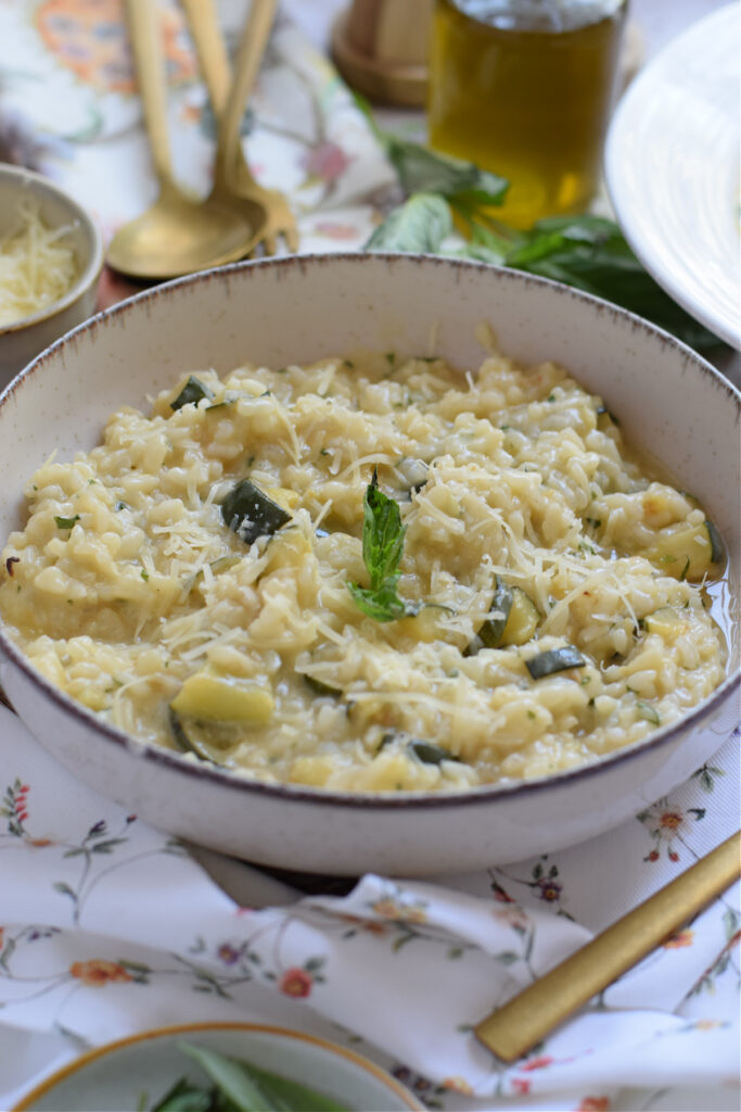 Creamy rice dish in a white bowl.