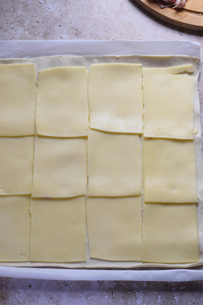 Puff Pastry topped with cheese slices.