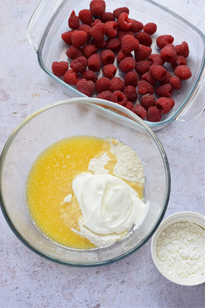 Ingredients to make a raspberry cobbler.