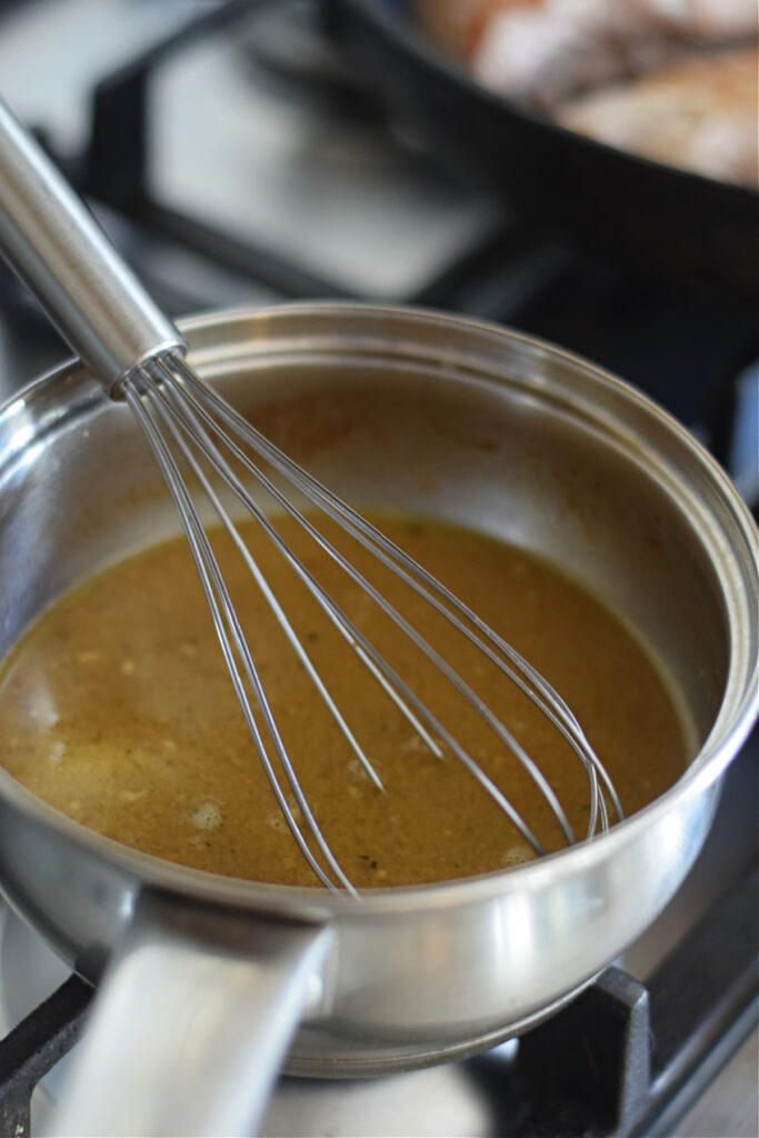Making a sauce in a saucepan.
