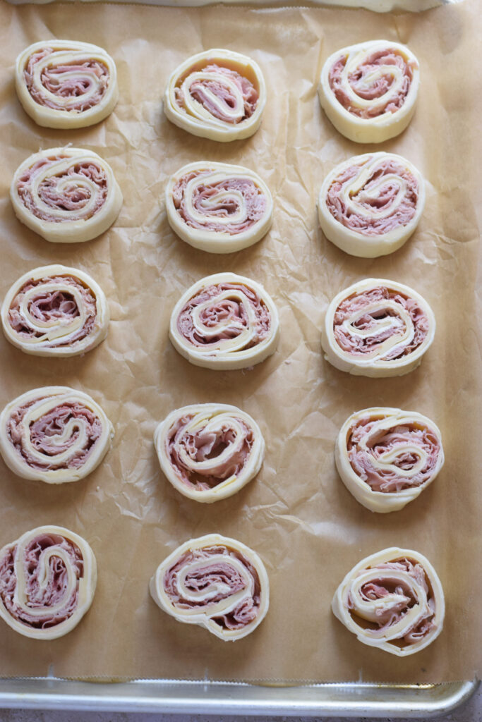 Ready to bake ham and cheese pinwheels.