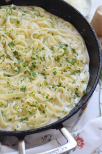 Close up of pasta in a skillet.
