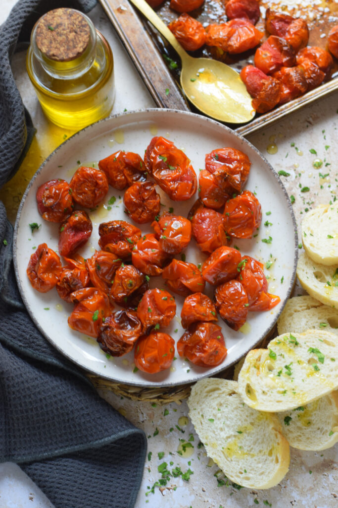 Cherry tomatoes on a white plate.
