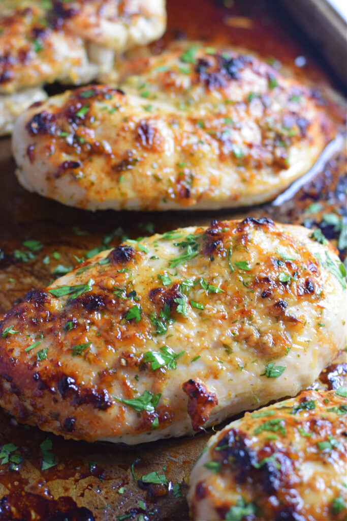Close up of baked honey garlic chicken breast.