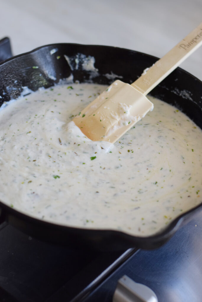 Making a ricotta pasta sauce.