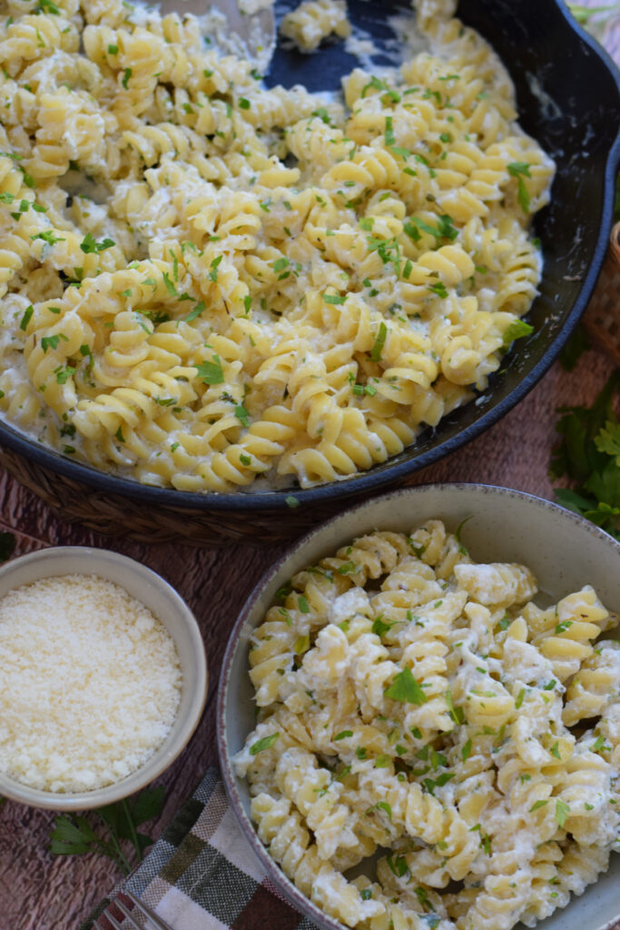 Creamy pasta in a skillet.