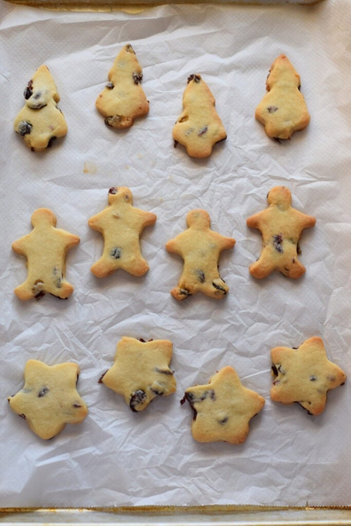 Baked shortbread on a baking tray.
