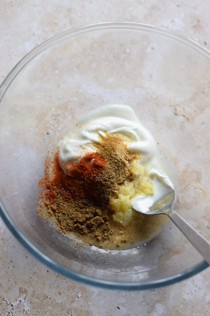 Marinade ingredients in a glass bowl.