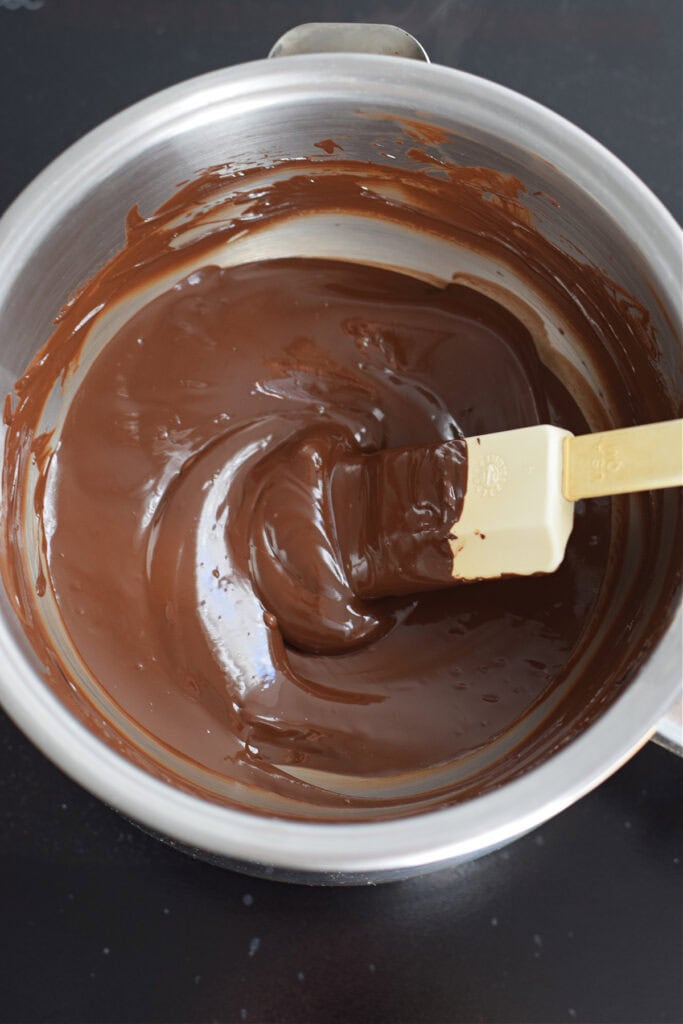 Melted chocolate in a saucepan.