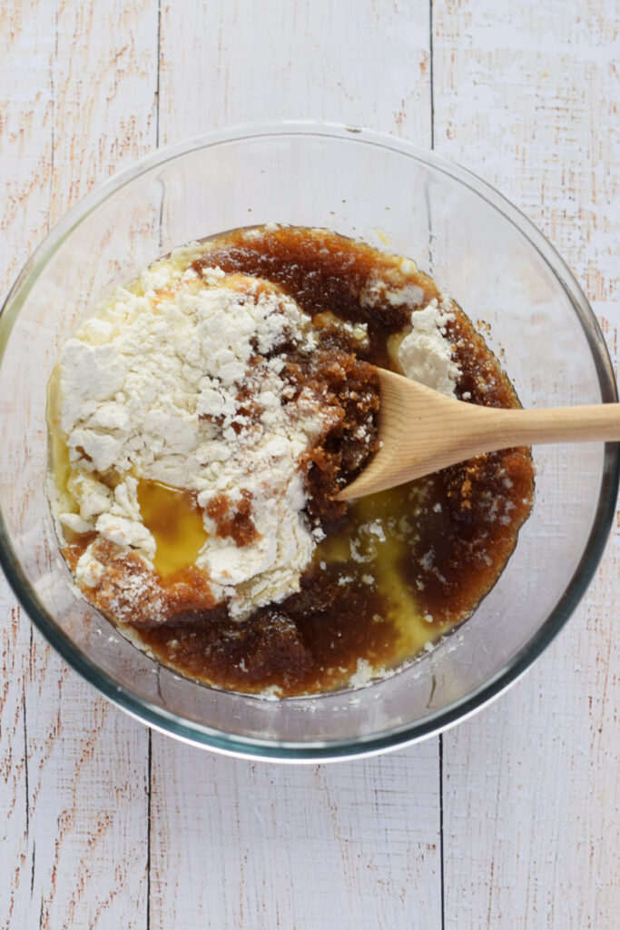 Ingredients in a glass bowl to make a cookie base.
