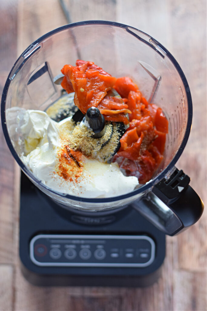 Ingredients in a food processor to make a dip.