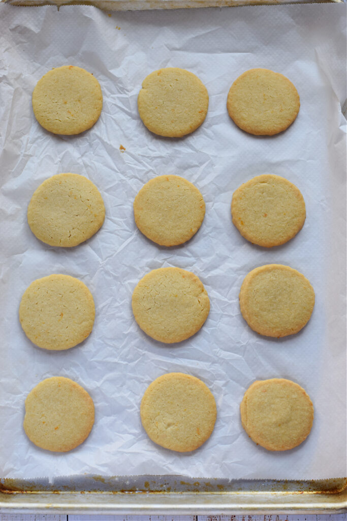 Baked shortbread cookies on a tray.