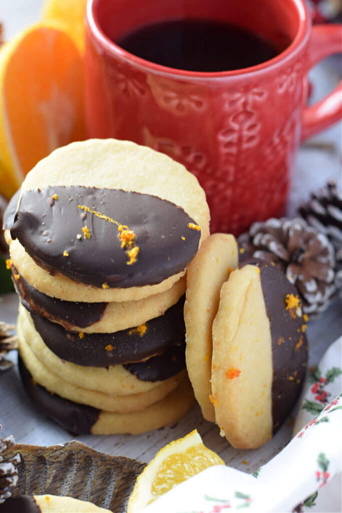 A stack of orange shortbread cookies.