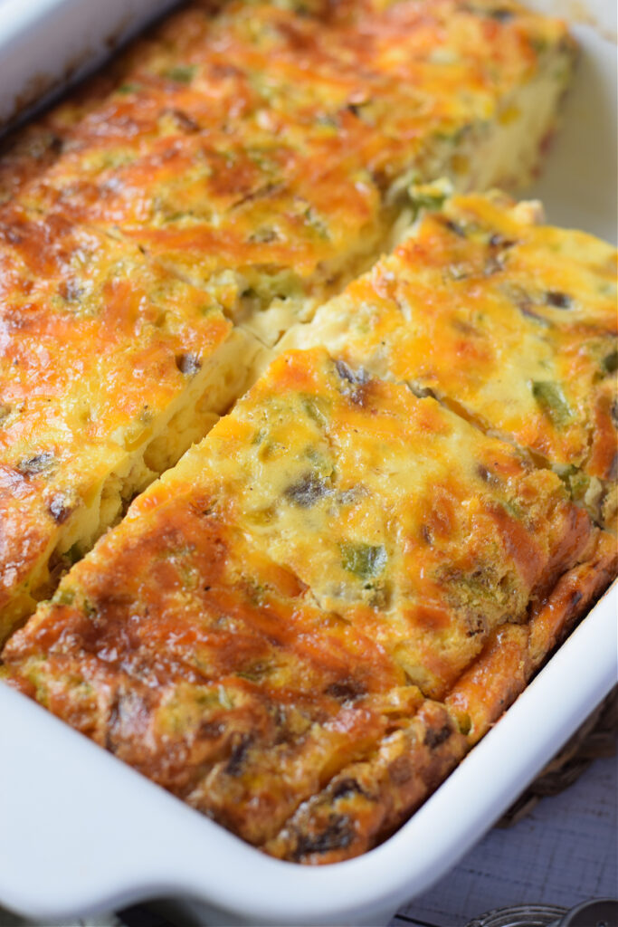 Breakfast casserole in a white dish.
