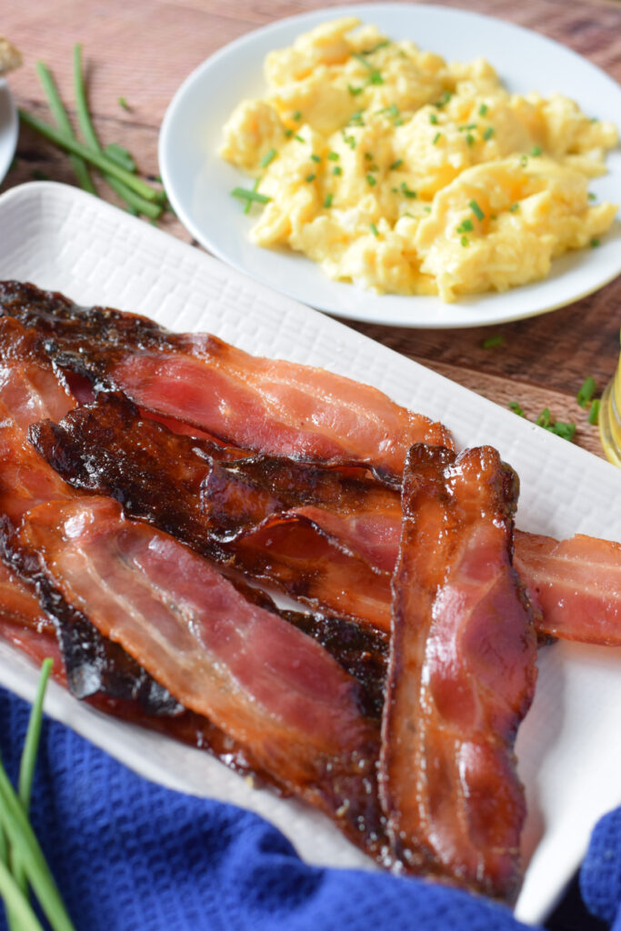 Close up of baked bacon with brown sugar.