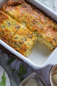 Breakfast casserole in a white dish.