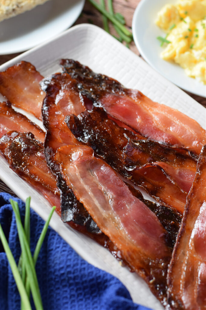 Close up of baked bacon with brown sugar.
