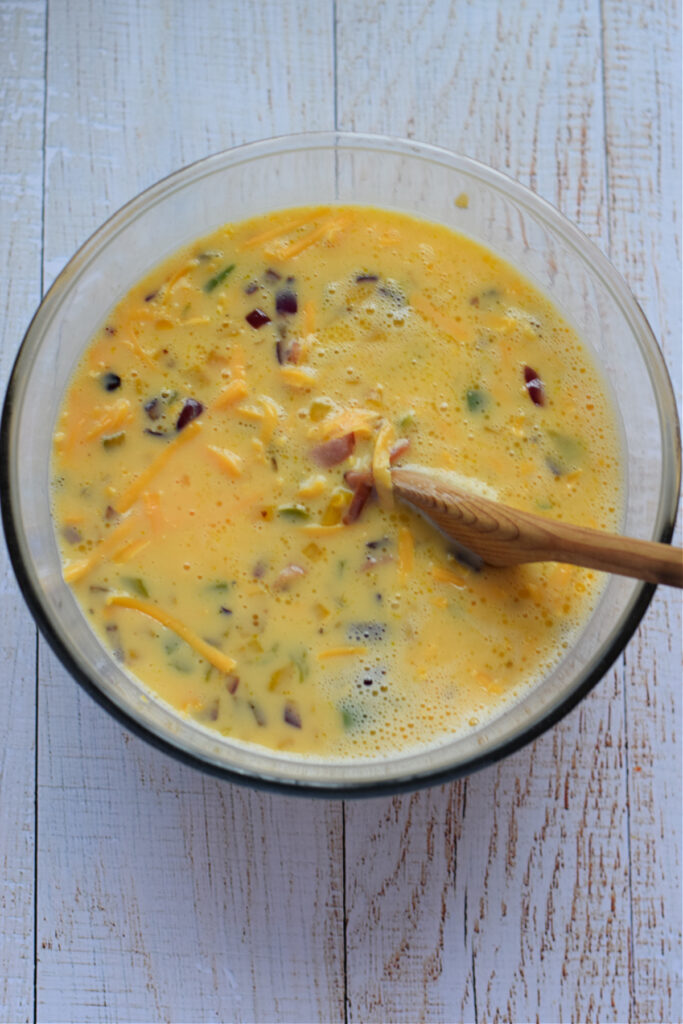 Making egg filling in a glass bowl.