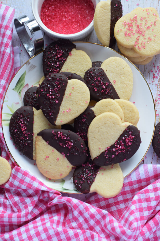 Chocolate heart cookies on a plate.
