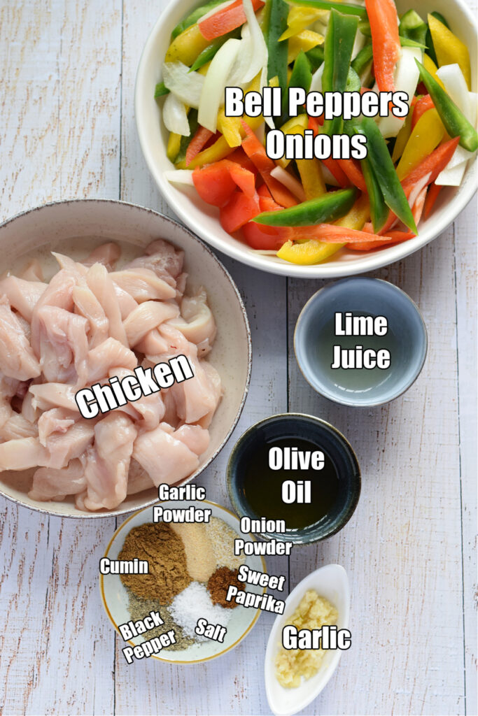 Ingredients to make sheet pan chicken and peppers.