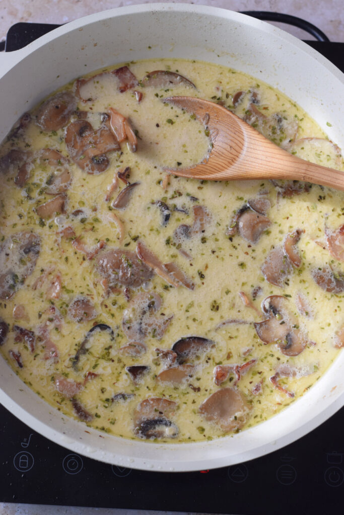 Making a cream sauce in a skillet.