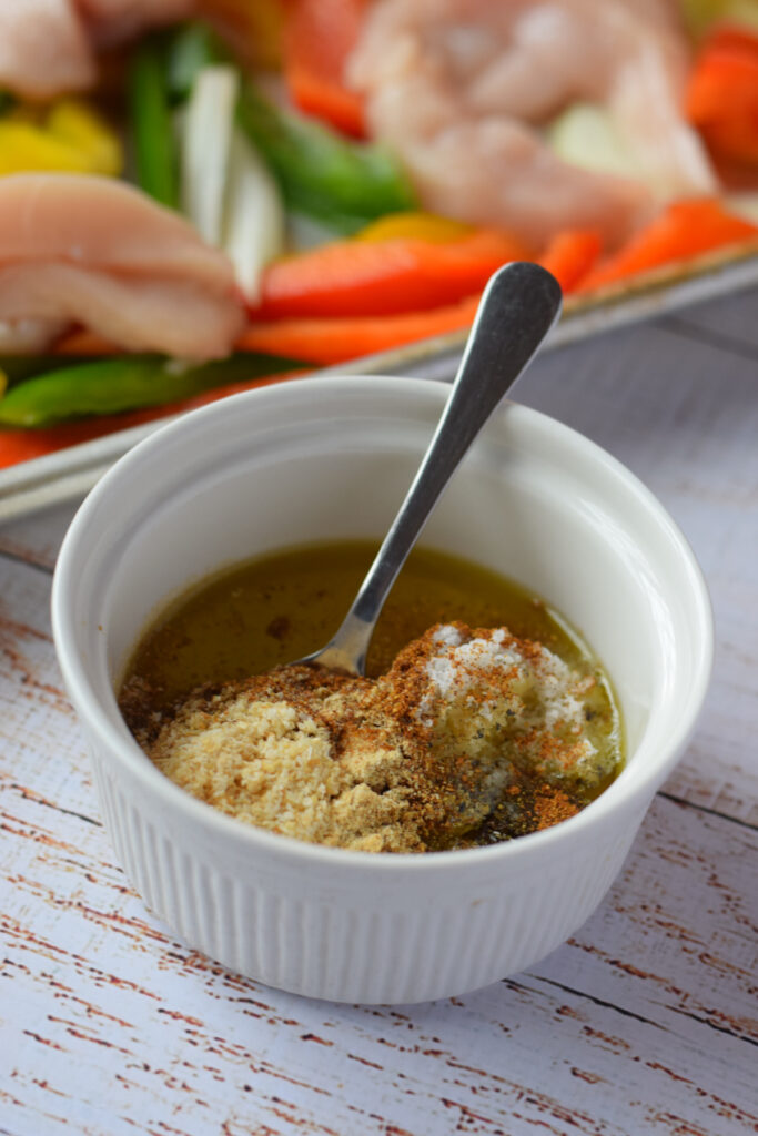 Marinade ingredients in a small white bowl.