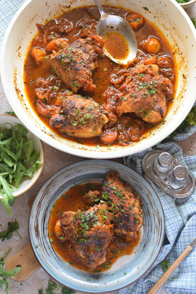 Stovetop chicken thighs in a tomato sauce.