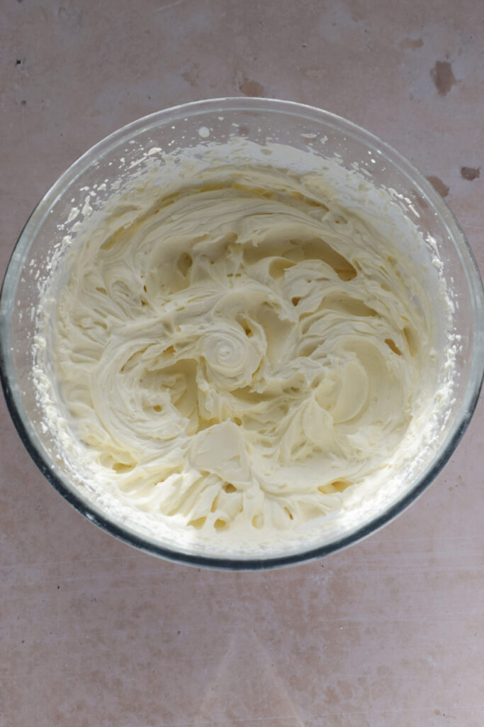 Mascarpone whipped cream in a bowl.