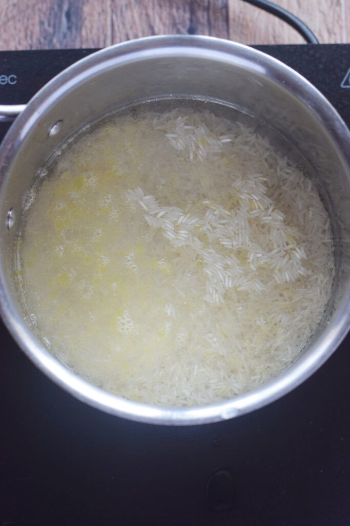 Cooking rice in a saucepan.