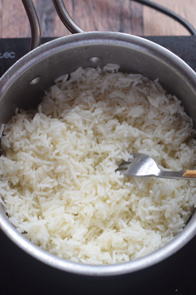 Fluffed rice in a saucepan.