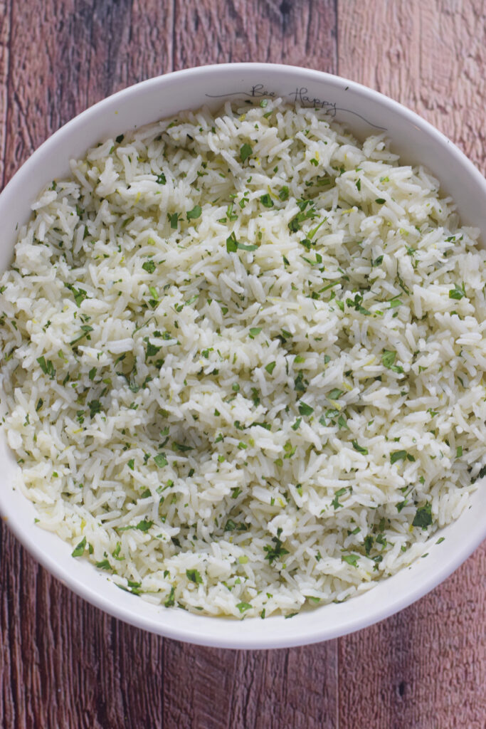 Cilantro lime rice in a white bowl.
