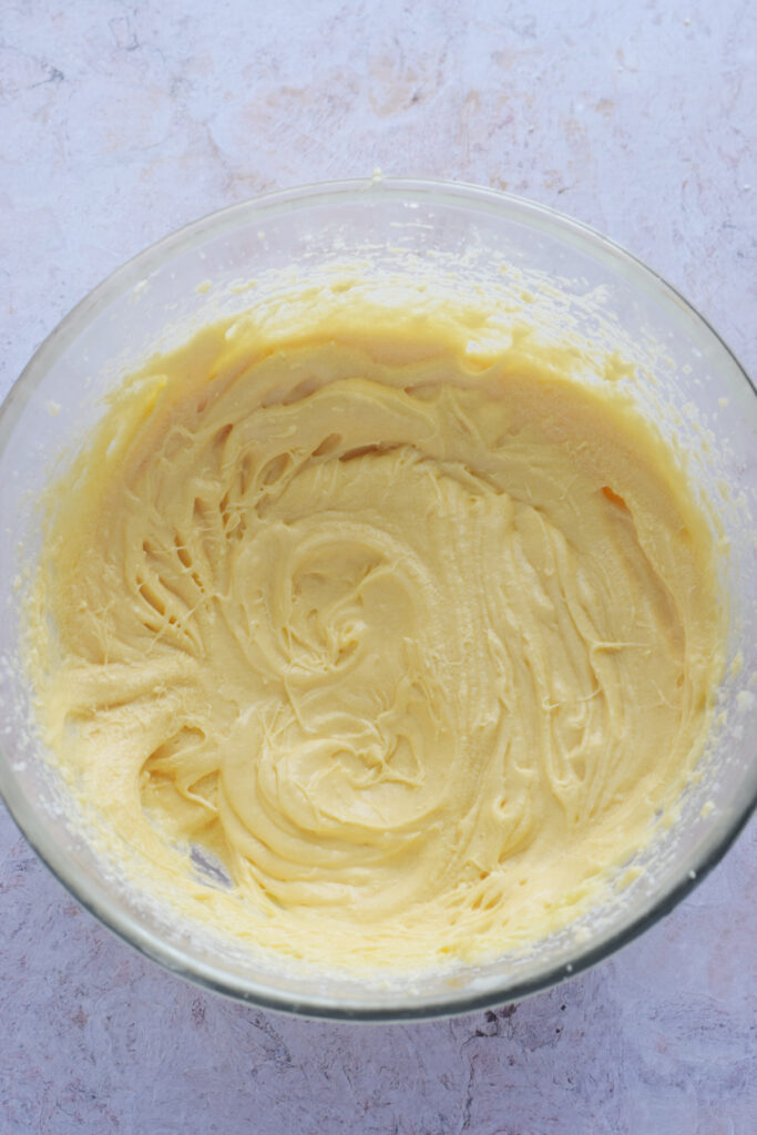 Making muffin batter in a glass bowl.