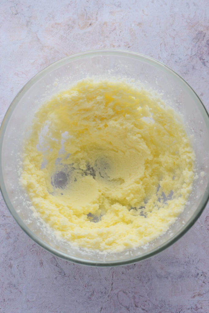 Whipped sugar and butter in a bowl.