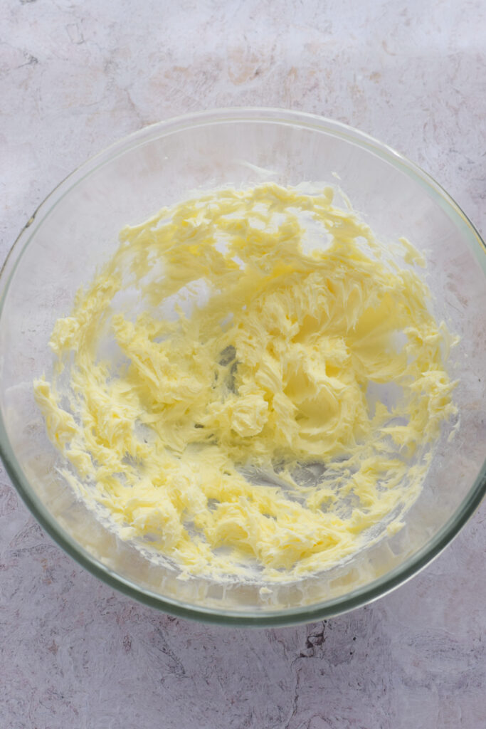 Whipped butter in a glass bowl.