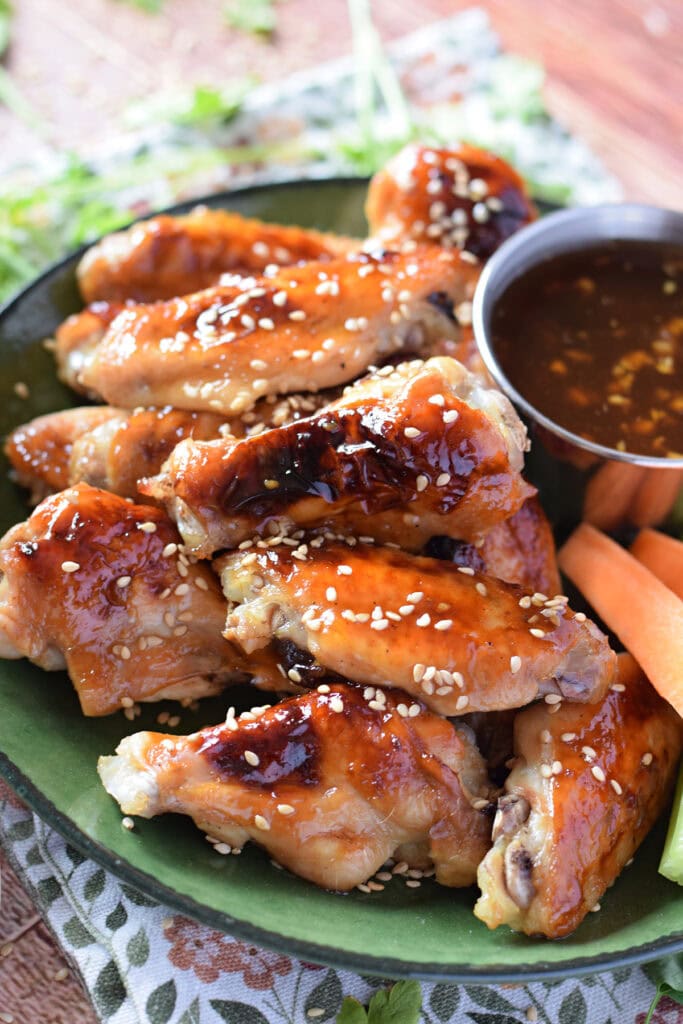 Baked teriyaki chicken wings with sesame seeds.