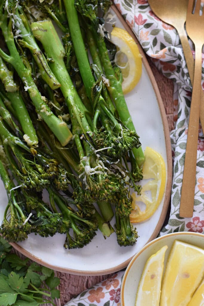 Close up of tenderstem broccoli on a serving dish.