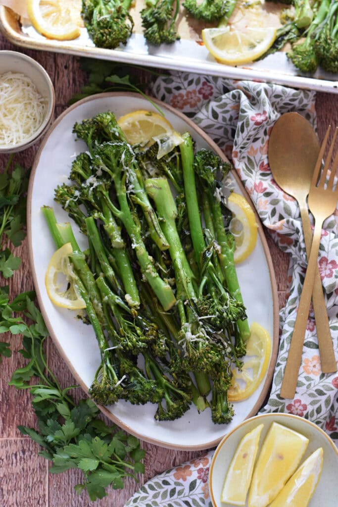 Roasted broccolini on a serving dish.