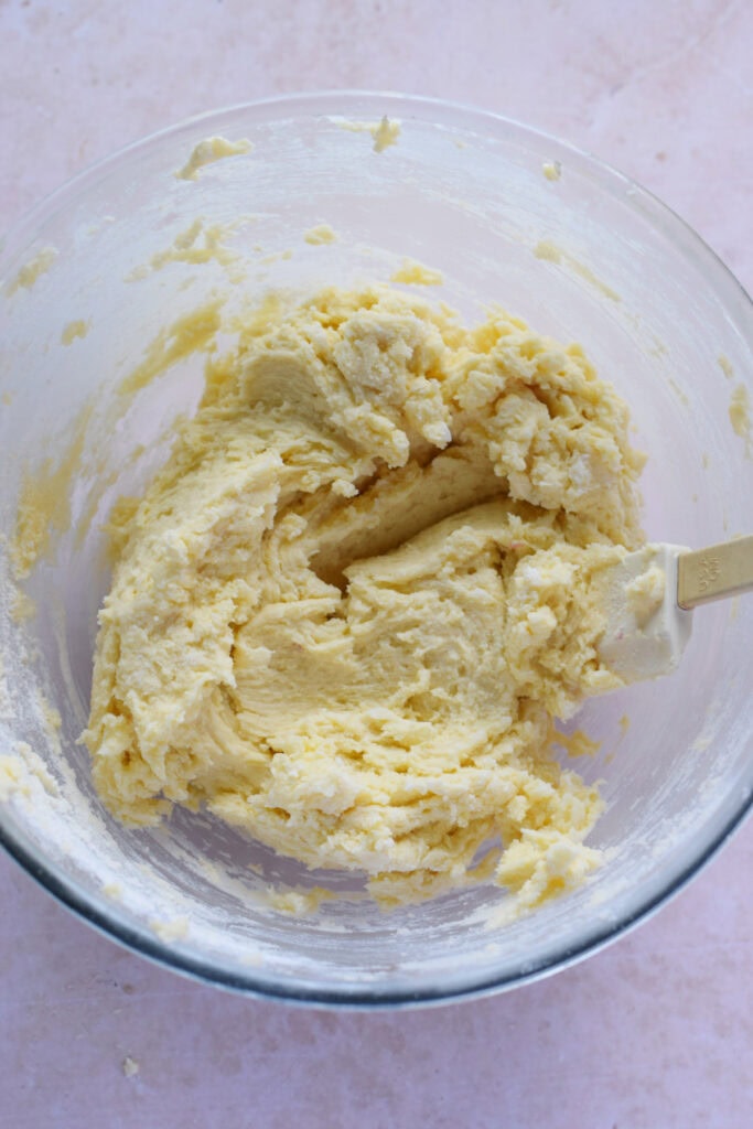 Cake batter in a glass bowl.