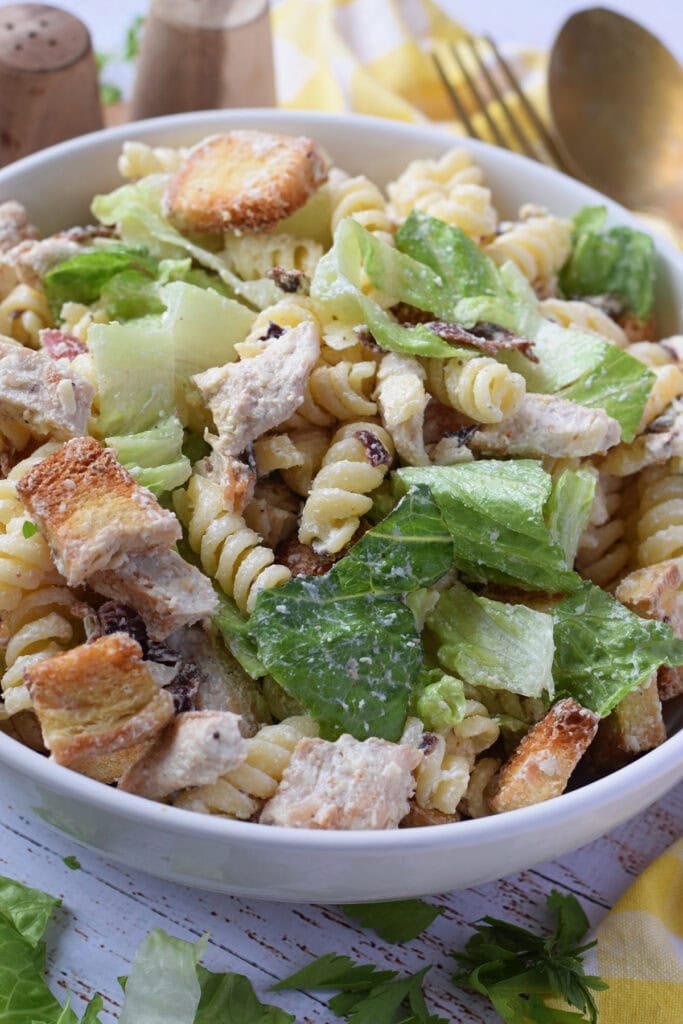 Close up of chicken caesar pasta salad.