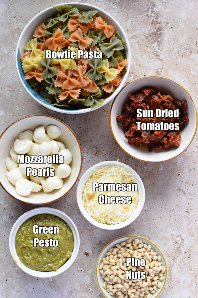 Ingredients to make green pesto pasta salad.