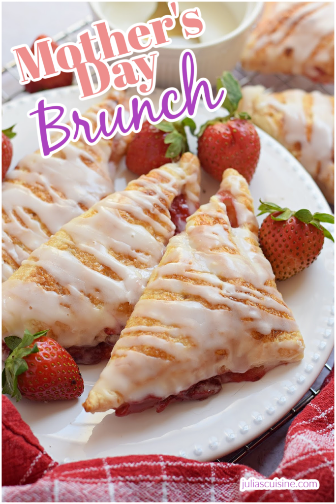 Jam turnovers on a white plate.