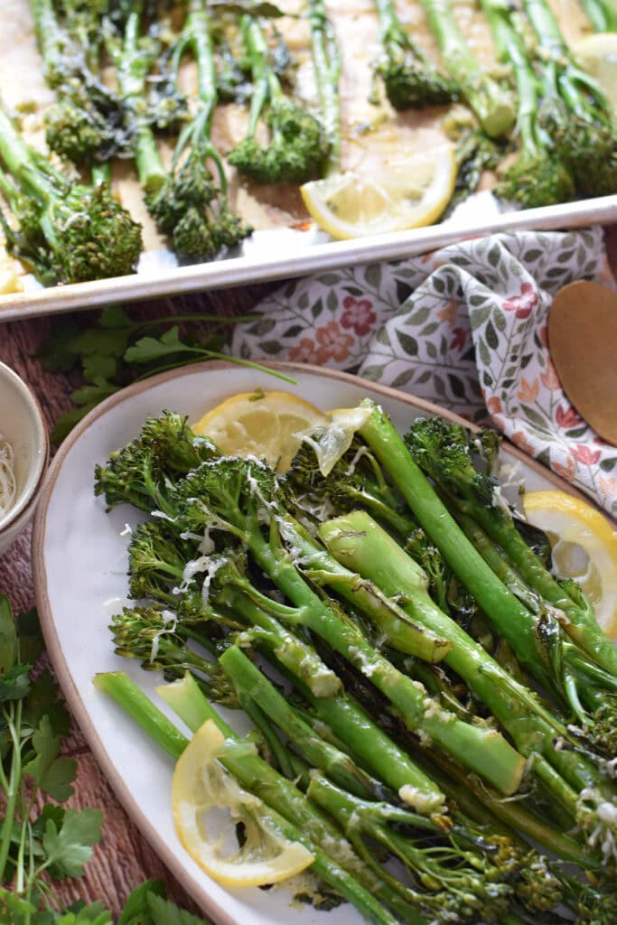 Roasted broccolini on a serving plate.