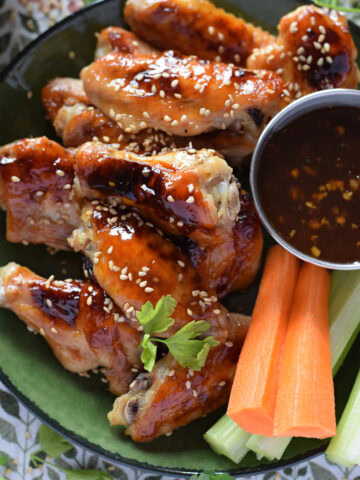 Close up of teriyaki chicken wings.