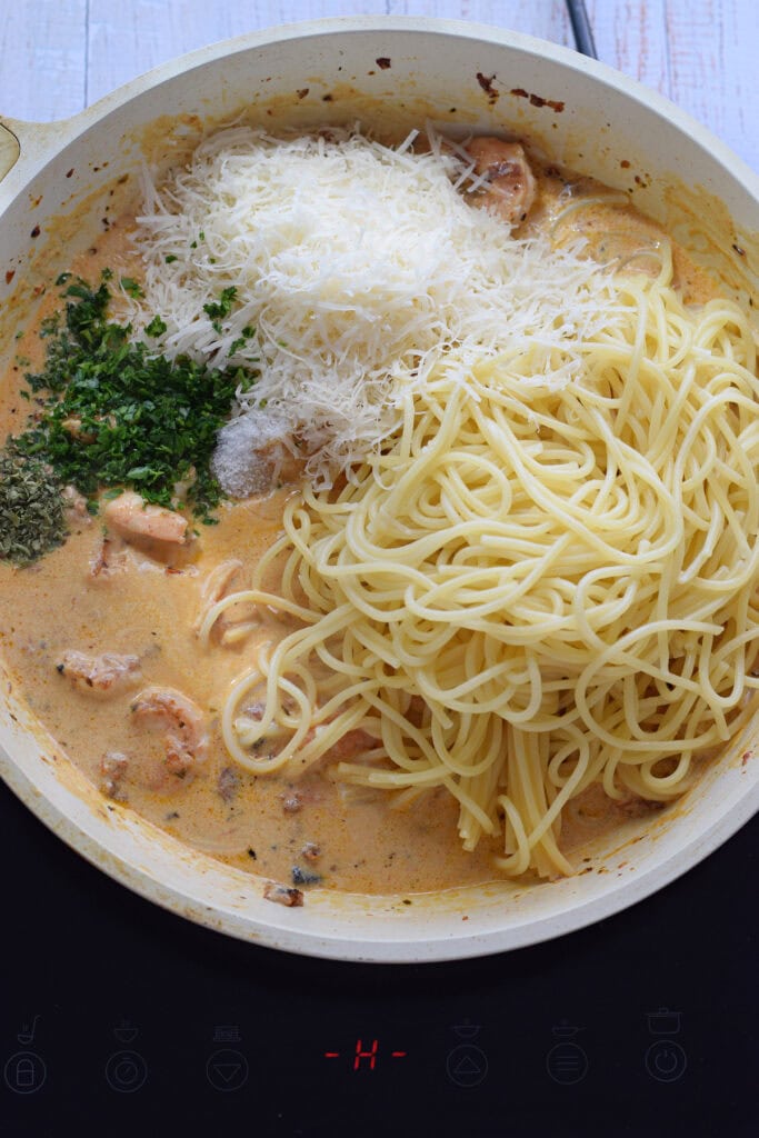 Making a creamy pasta dish.