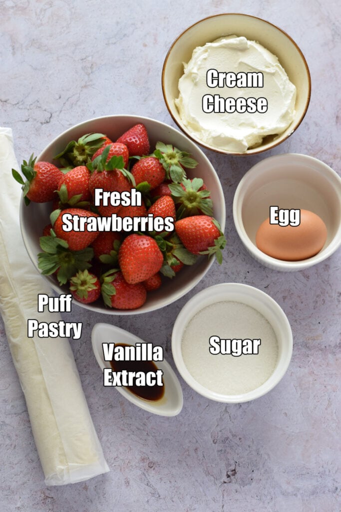 Ingredients to make a strawberry puff pastry danish.