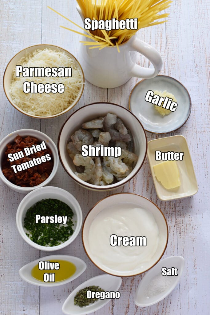 Ingredients to make shrimp pasta with sun dried tomatoes.
