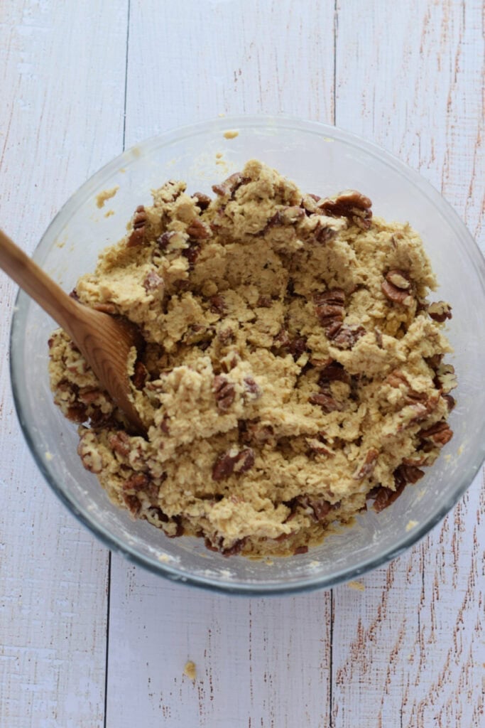Pecan cookie dough in a bowl.