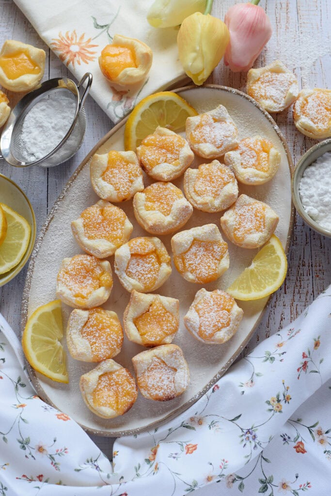 Lemon puff pastry on a whtie plate.