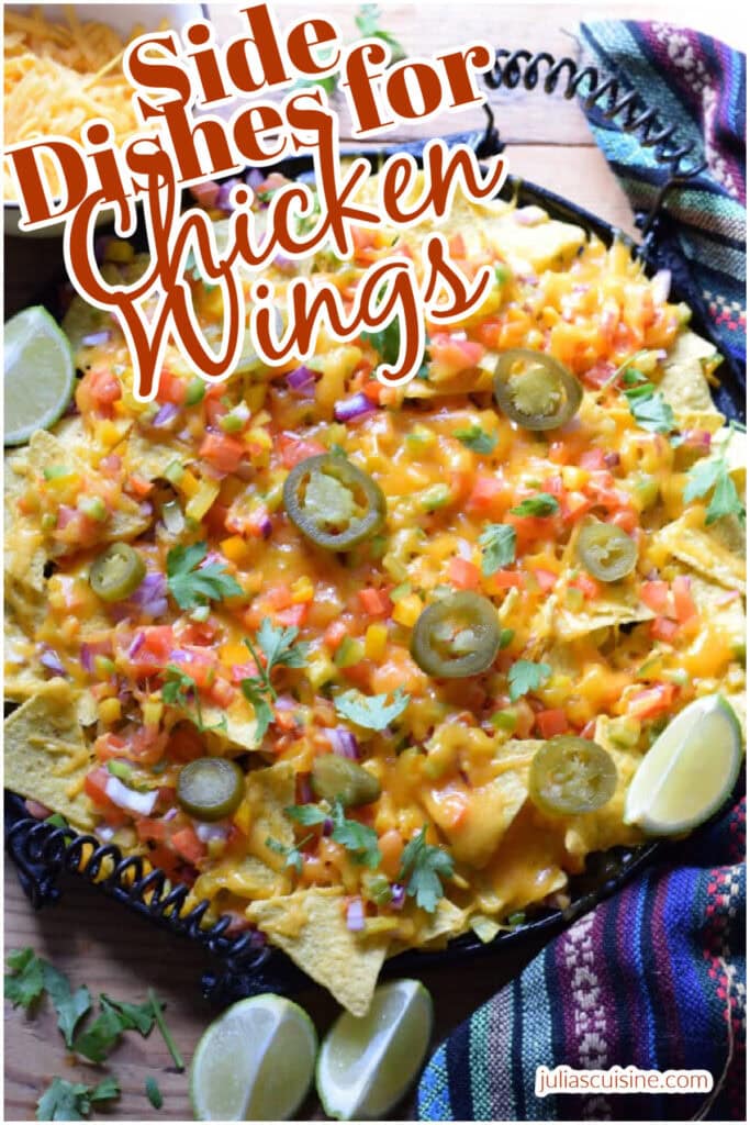 A plate of nachos on a cast iron dish.